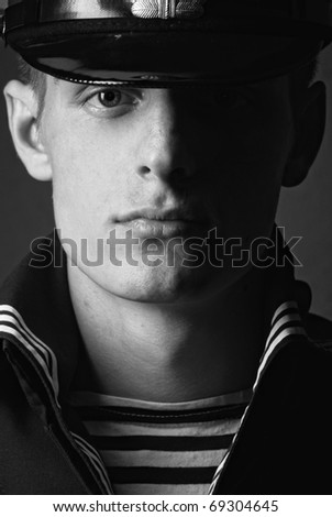 Portrait  of a young model in navy uniform
