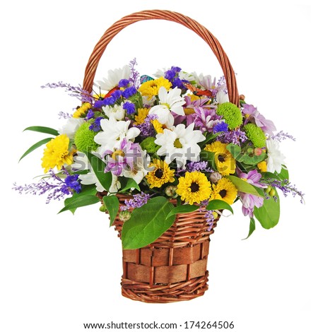 Bouquet from gerbera flowers in wicker gift basket isolated on white background.