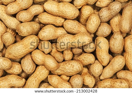 Dry roasted peanuts for use as background.