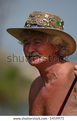Fisherman with well travelled hat