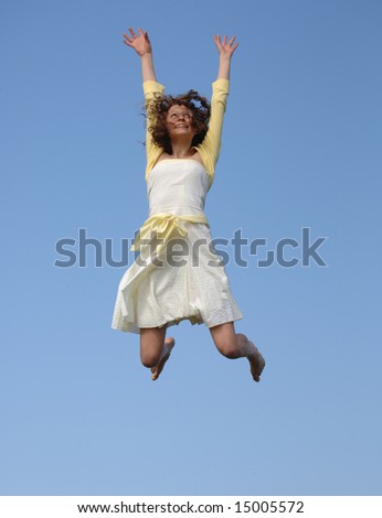 Very Attractive Teenager Jumping for Joy