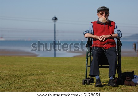 Bearded Old Man Happily Posing for the Camera