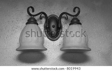 two light fixture on wall sconce