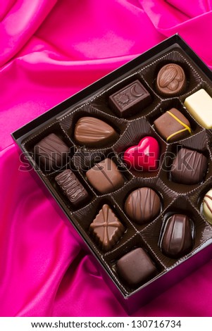 Assorted gourmet chocolate in a box.