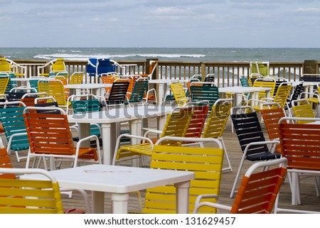 Empty patio with multi color chair.
