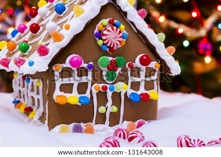 Gingerbread house with round  peppermint candies.