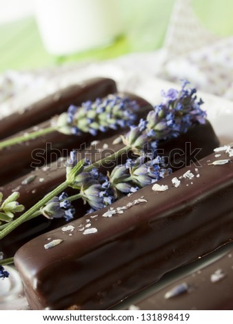 Gourmet lavender chocolate bars on white seving plate.