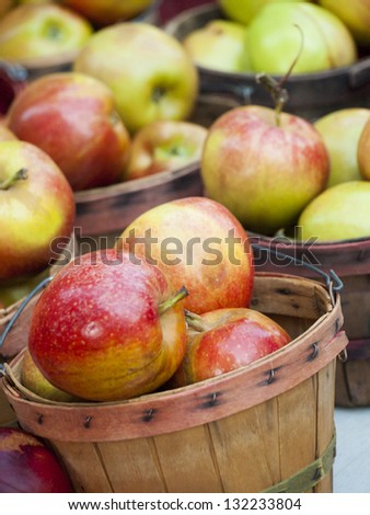 Fresh apples at the local farmers market. Farmers markets are a traditional way of selling agricultural products.