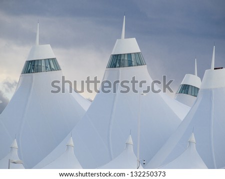 Denver International Airport well known for peaked roof. Design of roof is reflecting snow-capped mountains.
