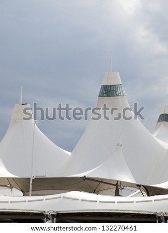 Denver International Airport well known for peaked roof. Design of roof is reflecting snow-capped mountains.