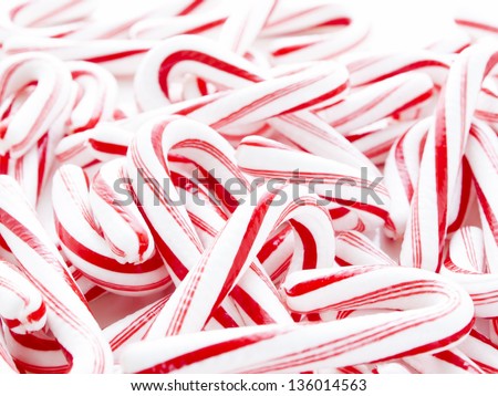 Peppermint candy canes on white background.