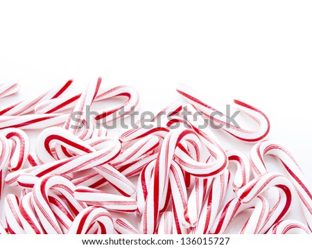 Peppermint candy canes on white background.