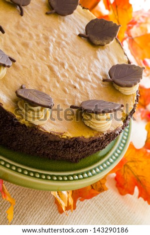 Pumpkin white chocolate cheesecake for Thanksgiving.
