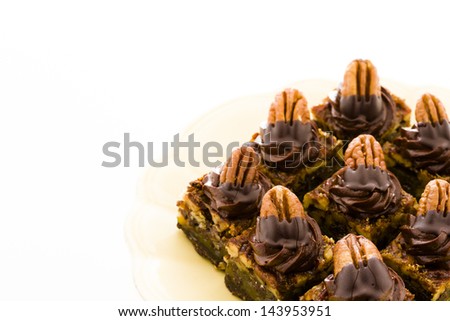 Small chocolate pecan squares at dessert bar.