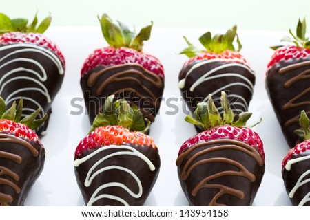 Chocolate dipped strawberries at dessert bar.