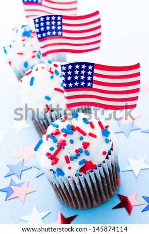 Patriotic holiday cupcakes decorated for july 4th.