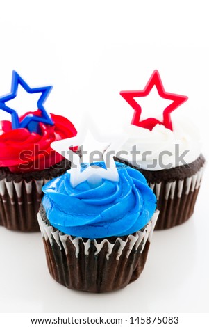 Patriotic holiday cupcakes decorated with stars.