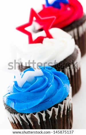 Patriotic holiday cupcakes decorated with stars.