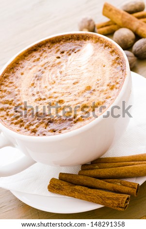 Five spice latter in a white cup.