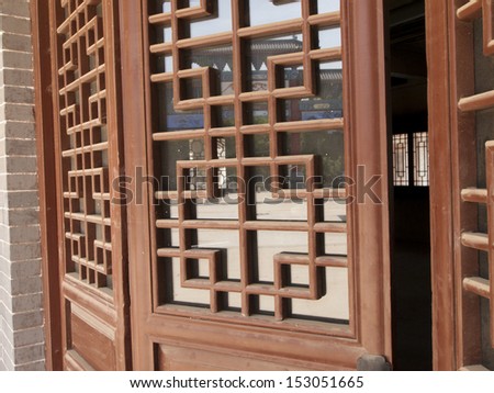 Traditional screen door of hutong in Xian, China.