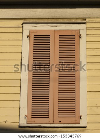 Window with closed shutters on Key West, Florida.