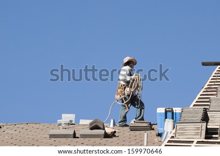 Roof repairs of an apartment building in Colorado.