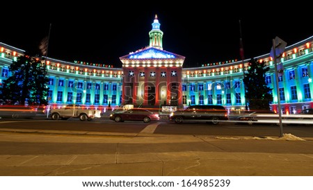 Downtown Denver at Christmas. Denver\'s City and County building decorated with holiday lights.