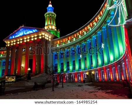 Downtown Denver at Christmas. Denver's City and County building decorated with holiday lights.