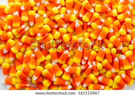 Halloween candy-corn on a white background.