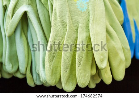 Garden gloves on display at the nursery.