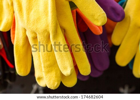 Garden gloves on display at the nursery.