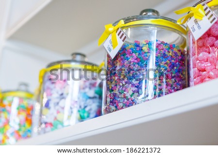 Jars filled with different candies at the boutique candy store.