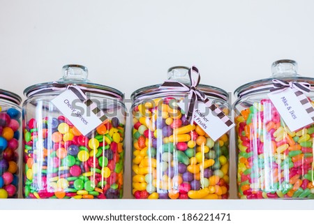 Jars filled with different candies at the boutique candy store.