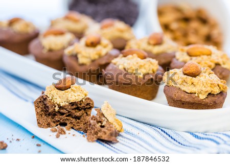 Gluten free chocolate baked snacks with peanut butter and whole almond.