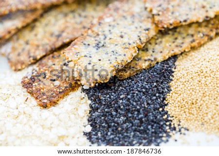 Gluten free crackers with seeds and quinoa flakes.