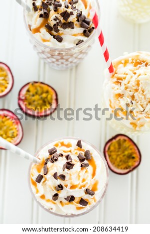 Gourmet cold passionfruit bliss chocolate drink garnished with dark chocolate.
