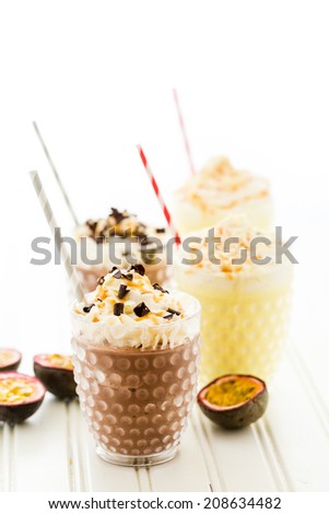 Gourmet cold passionfruit bliss chocolate drink garnished with dark chocolate.