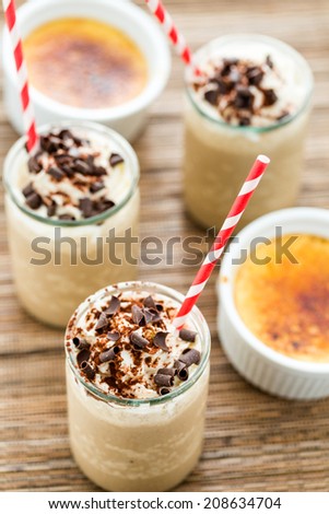 Gourmet cold cafe creme brulee chocolate drink garnished with dark chocolate.