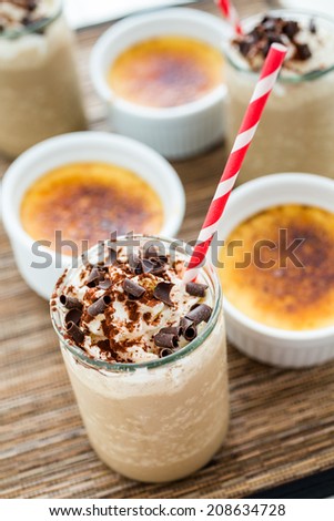 Gourmet cold cafe creme brulee chocolate drink garnished with dark chocolate.