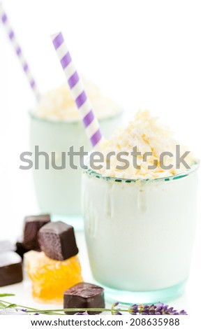 Gourmet cold honey lovender chocolate drink garnished with white chocolate.
