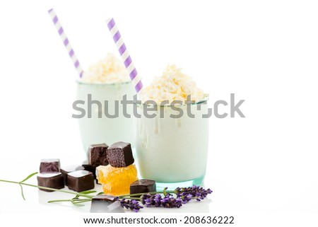 Gourmet cold honey lovender chocolate drink garnished with white chocolate.