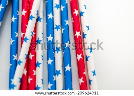 red, white and blue paper straws with stars.