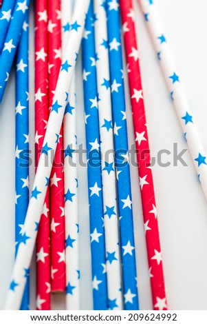 red, white and blue paper straws with stars.