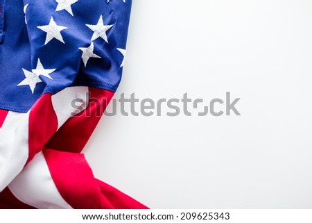 Tight closeup of the stars and stripes of an American Flag.