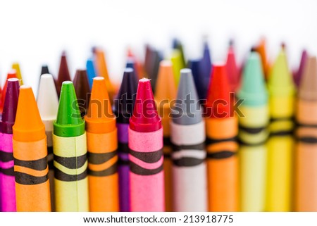 Multicolored crayons on a white background.