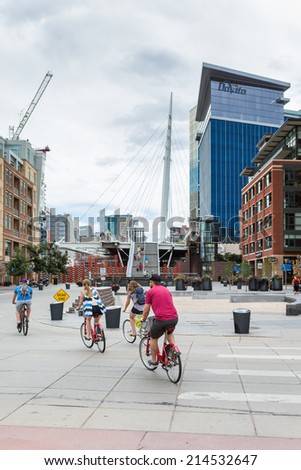 Denver, Colorado, USA-August 31, 2014. Biking on weekend in downtown Denver, Colroado.