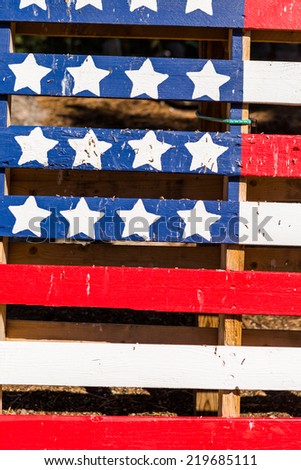 American flag painted on top of old wood pallet.
