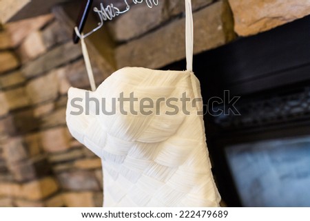Wedding dress hanging in a lobby of contemporary hotel.