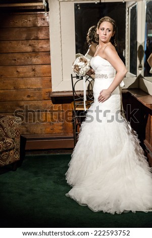 Bride wating in her room for start of wedding ceremony.