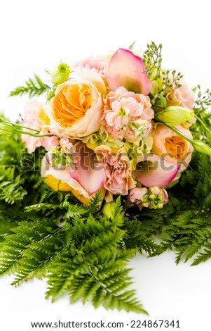 Small wedding bouquet with roses on a white background.